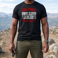 Load image into Gallery viewer, Service Connected Owns Eleven Flashlights - Funny Veteran Tee in Black, man, no face