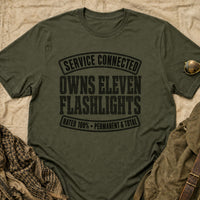 Load image into Gallery viewer, Service Connected Owns Eleven Flashlights - Funny Veteran Tee in Military Green, props flat